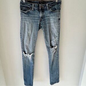 Levi's 524 Too Superlow Skinny women’s blue jeans size 7M Med stretch distressed
